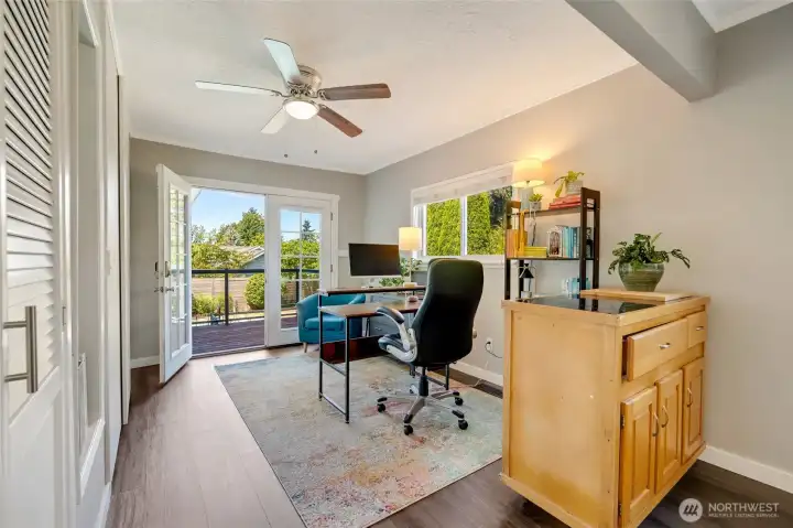 Another view of Main Level - Bonus Room. Very large space with French doors leading to the deck.