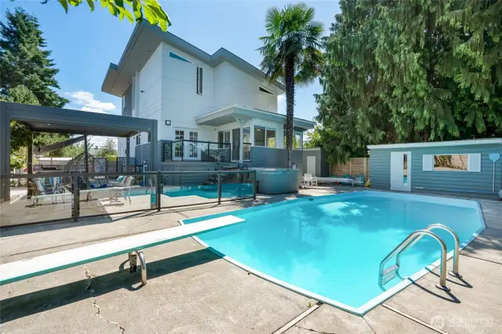 Heated Saltwater Pool and Pool House.