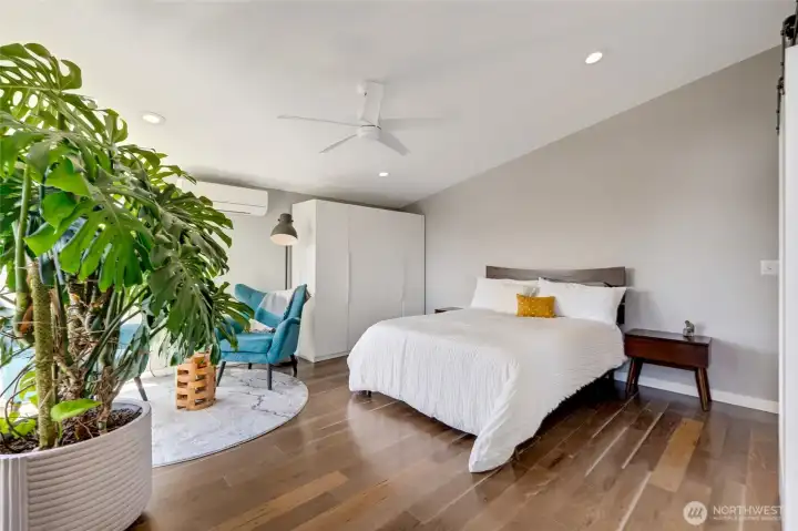 Expansive 2nd Floor Primary Suite w/ private bathing room and deck.