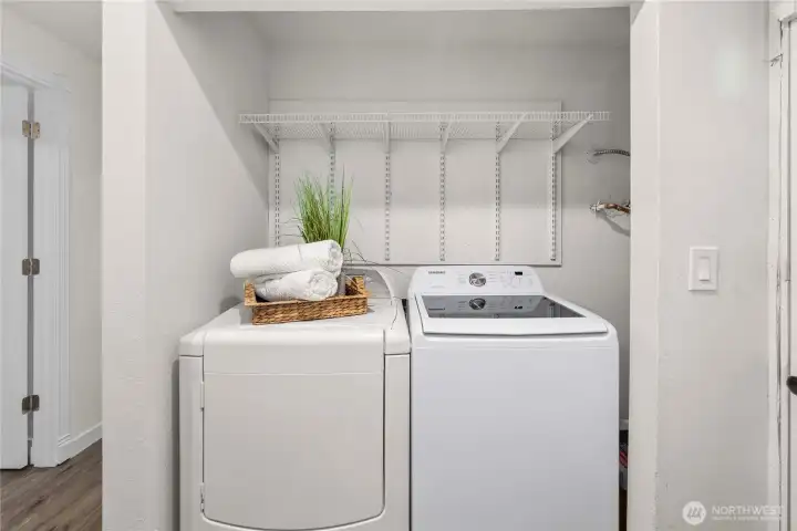 Full sized laundry appliances, water heater spot. Great front bench + charging station spot directly across.