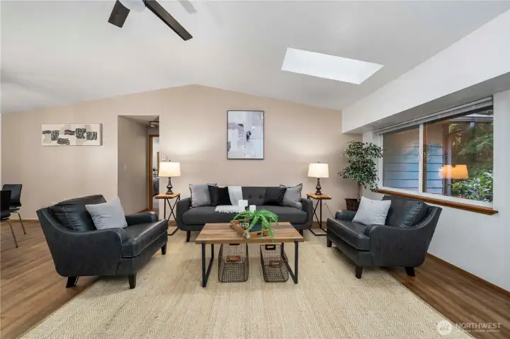The spacious living area greets you upon entrance.