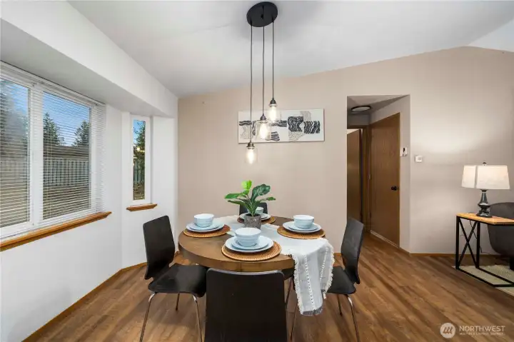Stepping out of the primary, find yourself in a designated dining area!
