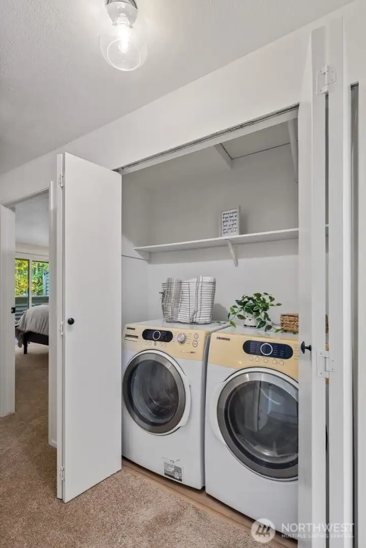 Convenient full-sized washer and dryer located upstairs.