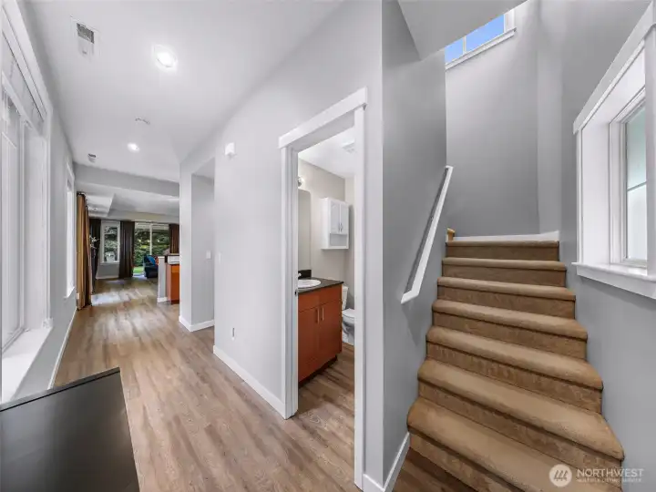 Bright and welcoming entry with updated flooring and an open flow into the main living spaces.