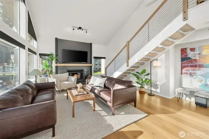 Updated staircawe leads to a large loft and incredible storage.