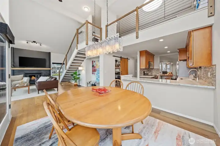 Dining area looking toward the living room and loft.