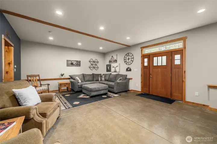 Living room with front entry.
