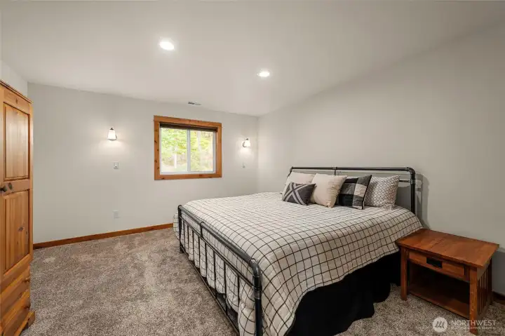 Spacious upper level bedroom 2 with king bed.