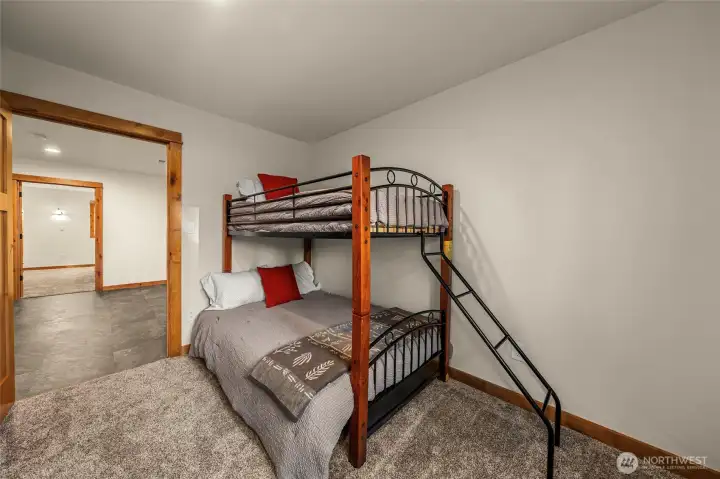 Upper level bonus bunkroom with a twin over full bunkbed.