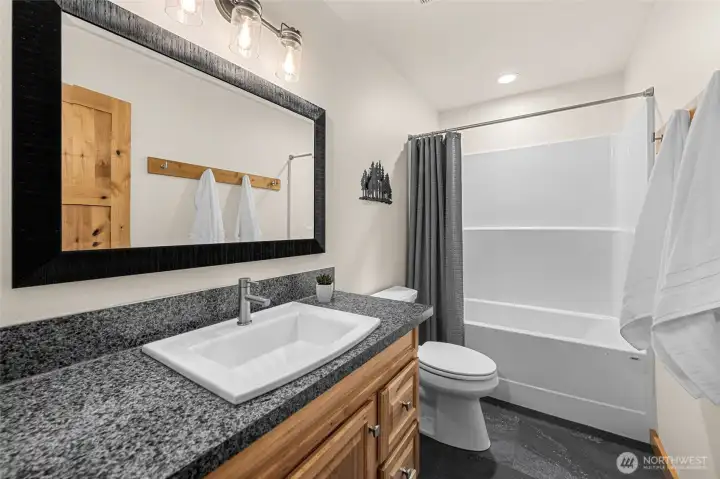 Upper level full bathroom.