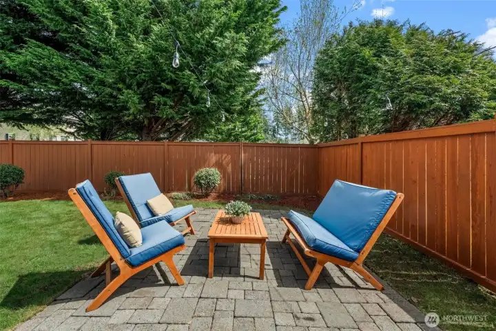 The ultimate backyard retreat! A seamless transition from the house leads to a spacious patio, offering the perfect stage for hosting friends or enjoying a quiet morning coffee