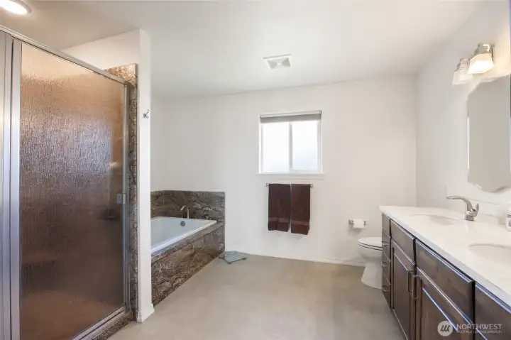 Primary bath is spacious with separate tub & shower