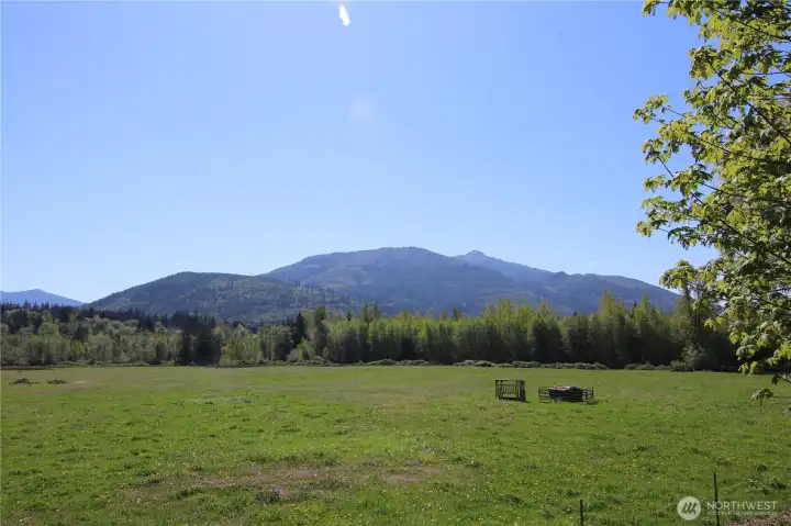 Gorgeous Foothills views beyond the property.  The treeline is about where the North border is, and the land is beyond