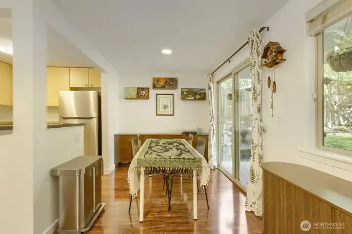 Dining room with slider door access to the patio and private yard space.