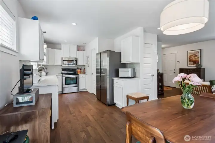Equipped with a updated refrigerator, dishwasher, and a new garbage disposal for added convenience.