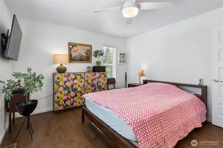 Wake up refreshed in this bright and inviting primary suite.