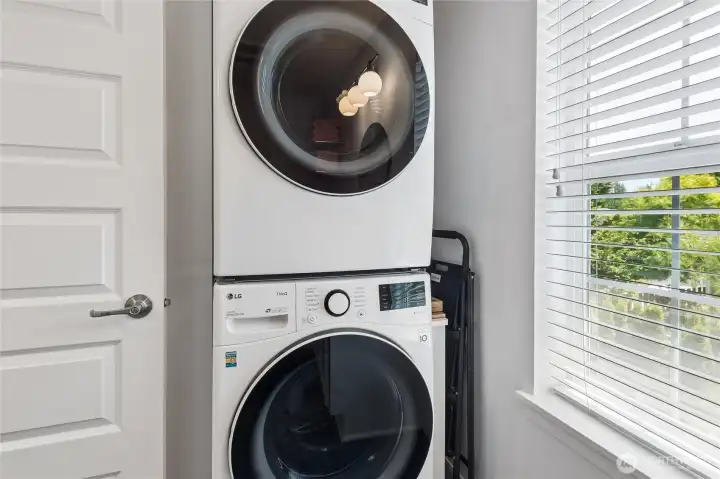 Updated appliances provide a move-in-ready utility area.