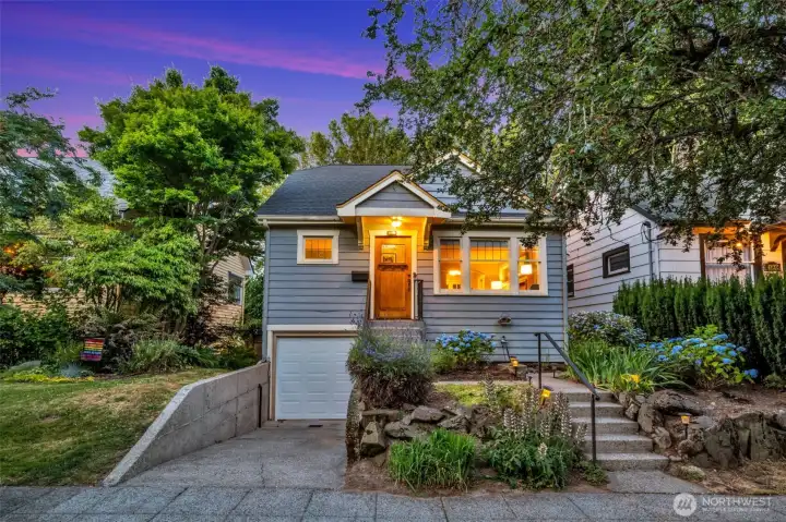 Tucked away on a leafy, tranquil street in coveted Bryant neighborhood, sits a beautifully updated 1926-built 3 bedroom, 1 bath cottage