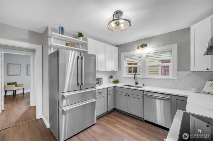 Recently updated kitchen has all the features expected, while the seeded glass fixtures harken back to the home's original era.