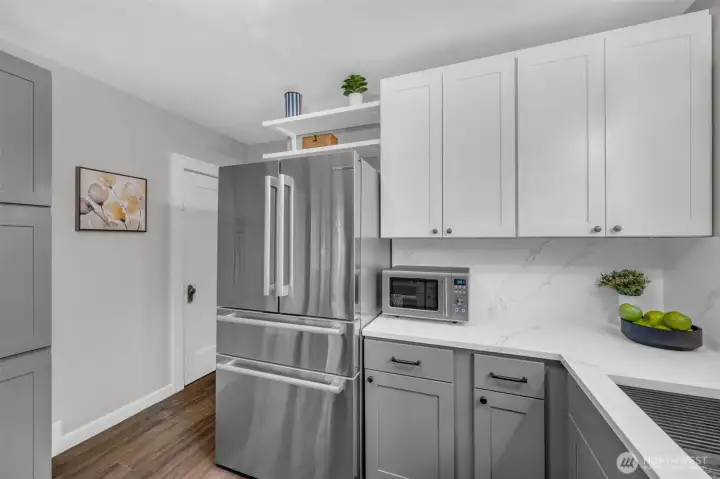 Another kitchen view - closed door goes to downstairs