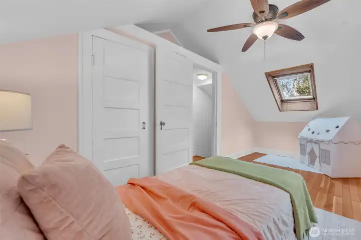 Second bedroom - both upstairs bedrooms also feature custom walk-in closets