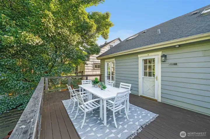 Step out from the main floor to recently expanded deck overlooking backyard. Perfect set up for summer bbqs!