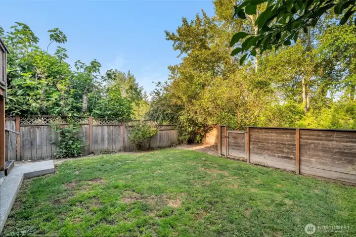 Large, flat, fully fenced yard