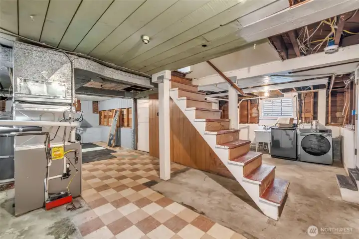 View of stairs to basement - so many options! Home business, gym, craft space and so on!