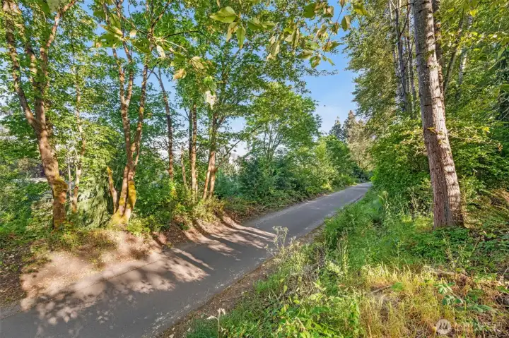 The Burke Gilman Trail is 19.8 miles long, starting in Ballard and ends in Bothell.  It follows the old Seattle Eastern railway route.