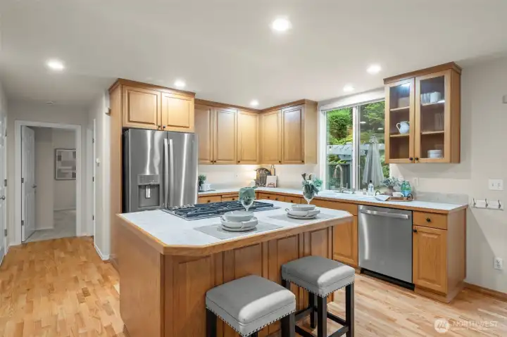 Gas Cooktop and Island Seating.  NEW WHITE QUARTZ C/TOPS WILL BE INSTALLED ON JULY 1ST