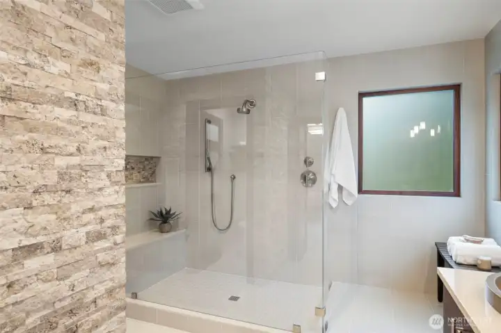 Primary Bath with Walk-In Shower and Custom Stone Wall