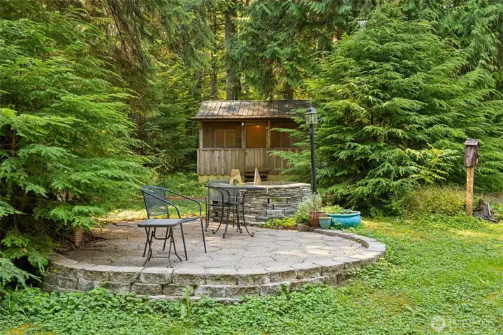 sitting area in front by two cabins