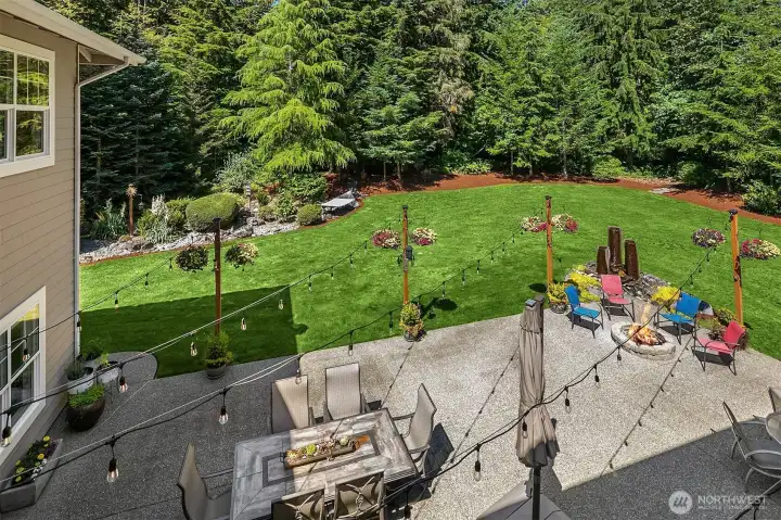 View of the backyard from the primary suite. Not shabby! View of the backyard from the primary suite. Not shabby!