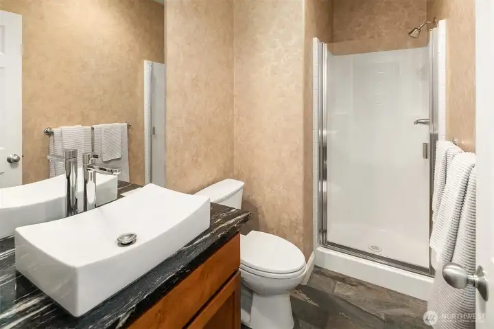 Just off the bedroom is this 3/4 bath -- Perfect for recouping after the ski knee injury. Just off the bedroom is this 3/4 bath -- Perfect for recouping after the ski knee injury.