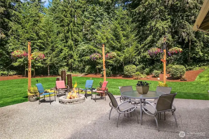 Fire pit built into the patio and lots of table seating. flower planters have to be seen in person --- Come to the open houses! Fire pit built into the patio and lots of table seating. flower planters have to be seen in person --- Come to the open houses!