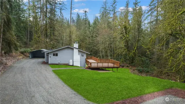 Long, Newly Graveled Driveway leads to 2-Car Carport + offers 2-Car Guest Parking (far right)