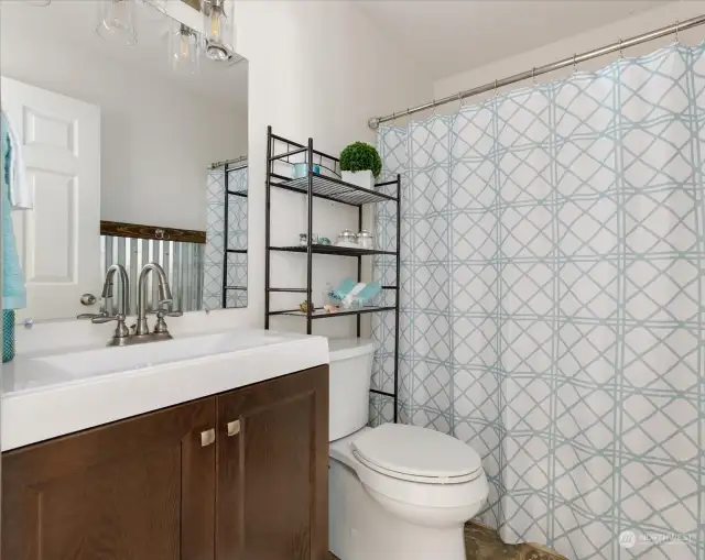 Updated downstairs full bathroom. Perfect for guests and access from bedroom/office!