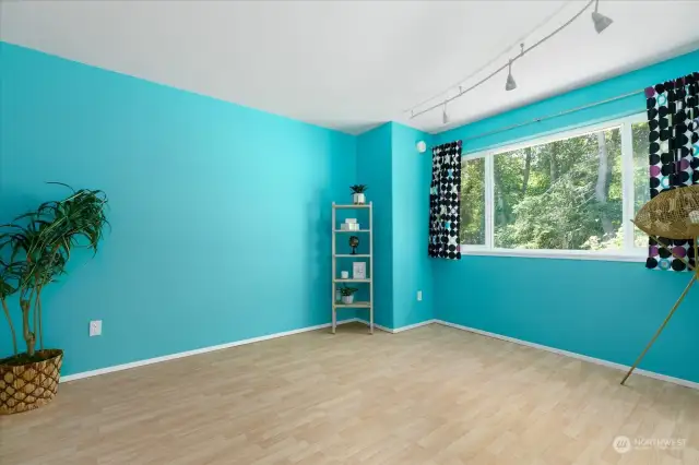 Guest bedroom? Upstairs office. Capture the fun of the colors in this room, or change it out to something less dramatic.