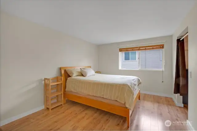 The primary bedroom can easily accommodate a king sized bed and additional furniture.