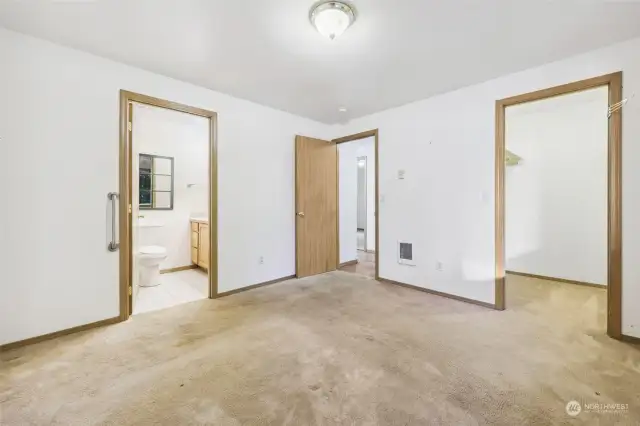 Primary bedroom with walk in closet and en-suite