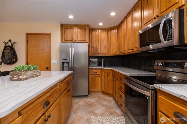 Kitchen has large pantry Beautiful Granite Counters