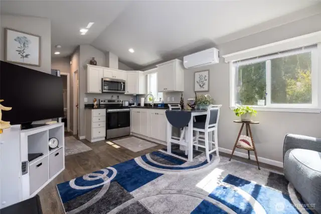 Tiny home is has it all even a washer and dryer.