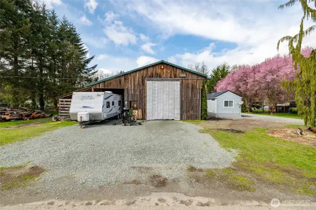 Shop has Bathroom, and bonus room upstairs could turn into living space or hobby room.