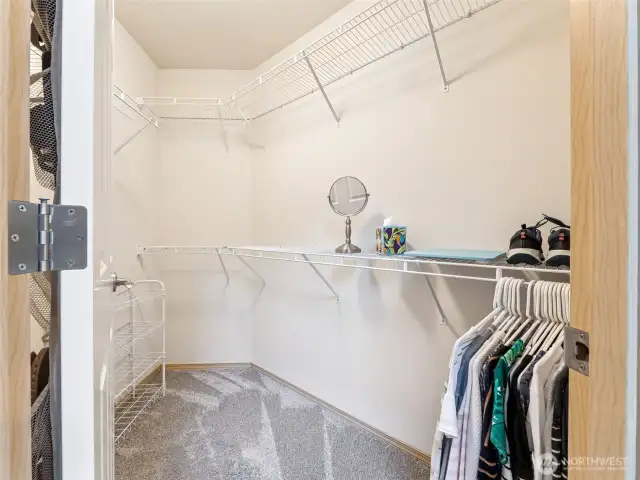 Walk-in closet of the primary ensuite - with great installed shelving.