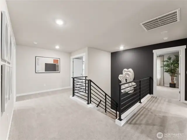 2nd floor landing area, check out the open railing and wide hallway. Photo is representational. Actual home is under construction and finishes and colors will vary. See site agent for details.