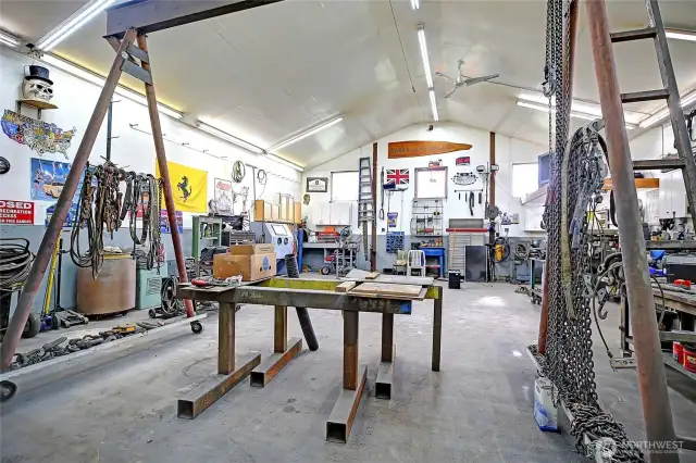 Car Lift for sale. Plenty of parking, radiant heat in the floors.
