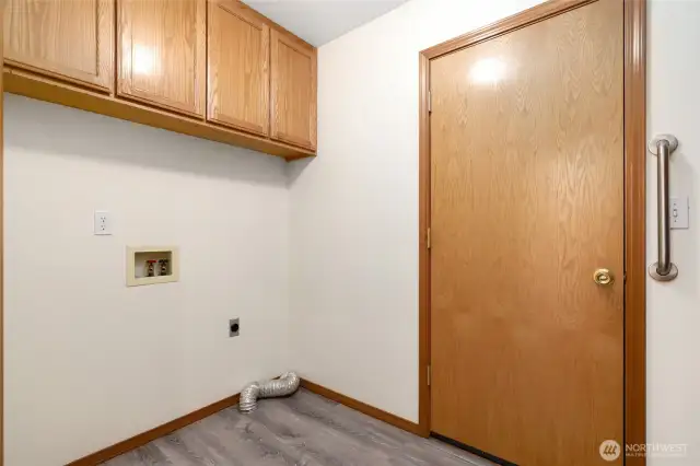 Utility Room with easy access to Garage.