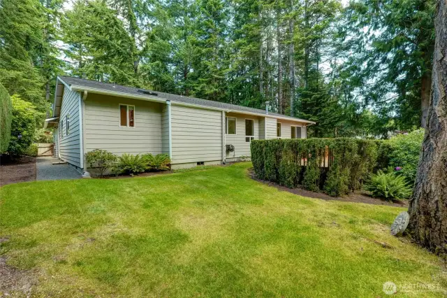 This home is located in a tranquil setting with a greenbelt on two sides.
