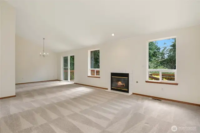 Enjoy the cozy fireplace in the living room.