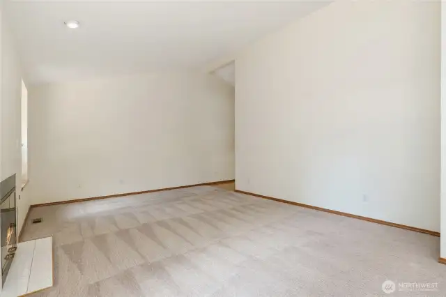 Living room easily accommodates a large TV.